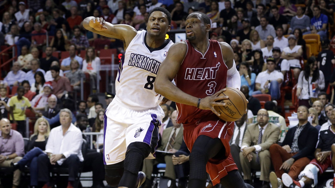 Heat's Big Three stay hot, roll past Kings